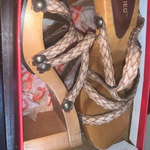 Wooden strappy clogs